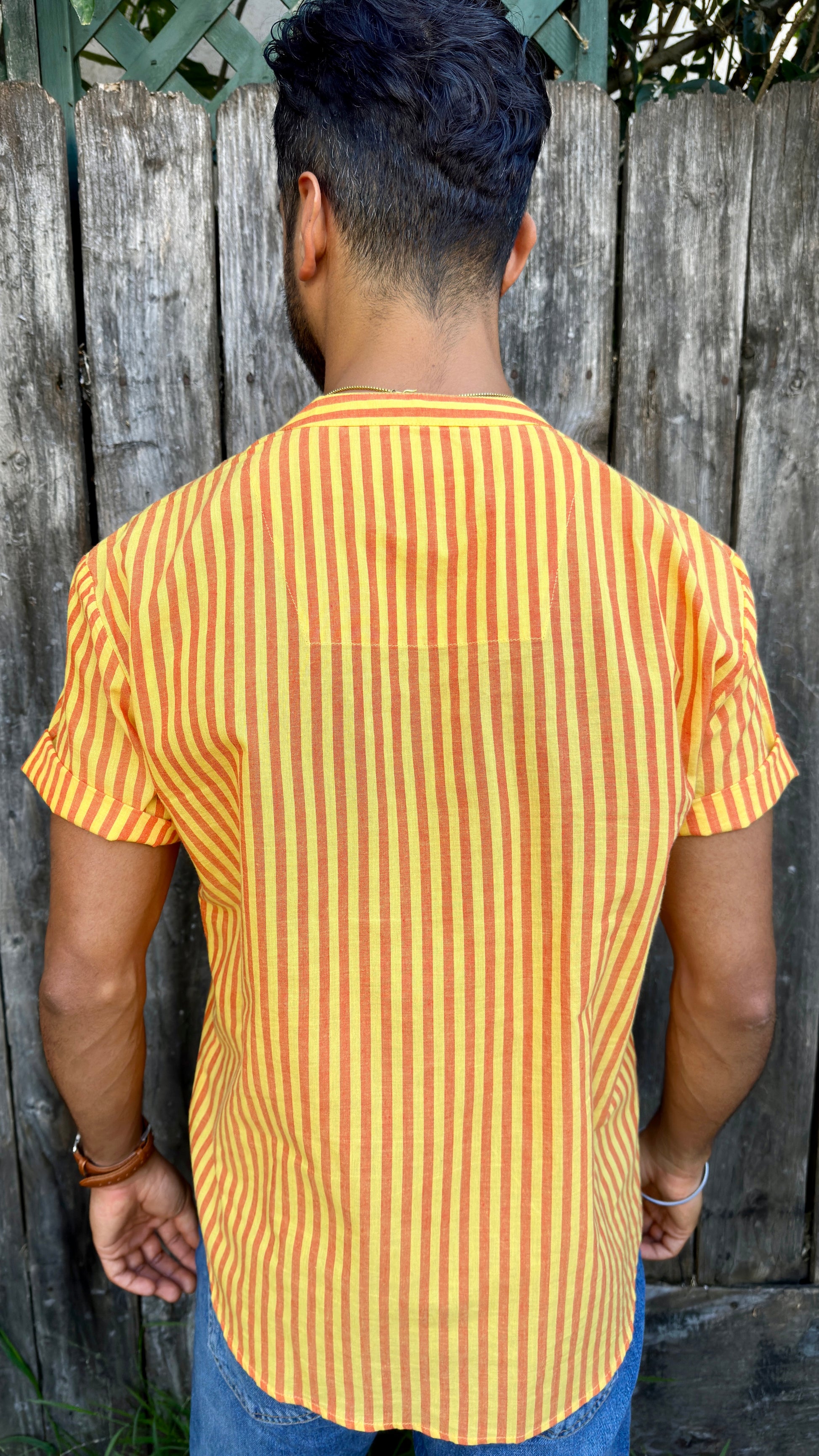 Garmee Summer | Kurta | Band Collar Men's Shirts Quarter Button Cotton. Showcasing the signature South Asian Band Collar neck coupled with coconut button enclosures; The Kurta effortlessly blends Eastern aesthetics with Western style. Quarter button, yellow & red stripes. A shirt designed to be a South Asian inspired elevated casual cotton shirt. 