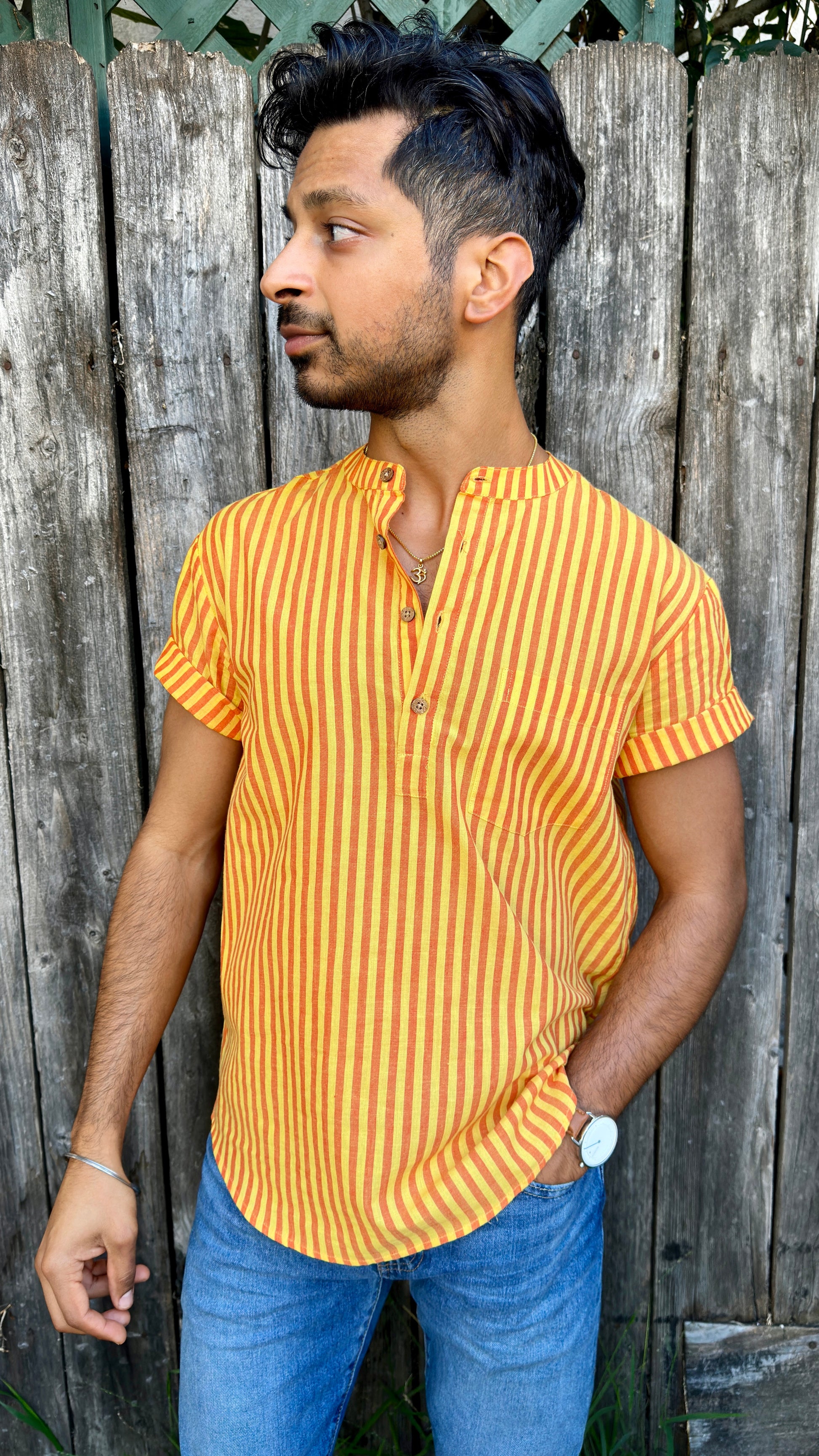 Garmee Summer | Kurta | Band Collar Men's Shirts Quarter Button Cotton. Showcasing the signature South Asian Band Collar neck coupled with coconut button enclosures; The Kurta effortlessly blends Eastern aesthetics with Western style. Quarter button, yellow & red stripes. A shirt designed to be a South Asian inspired elevated casual cotton shirt. 