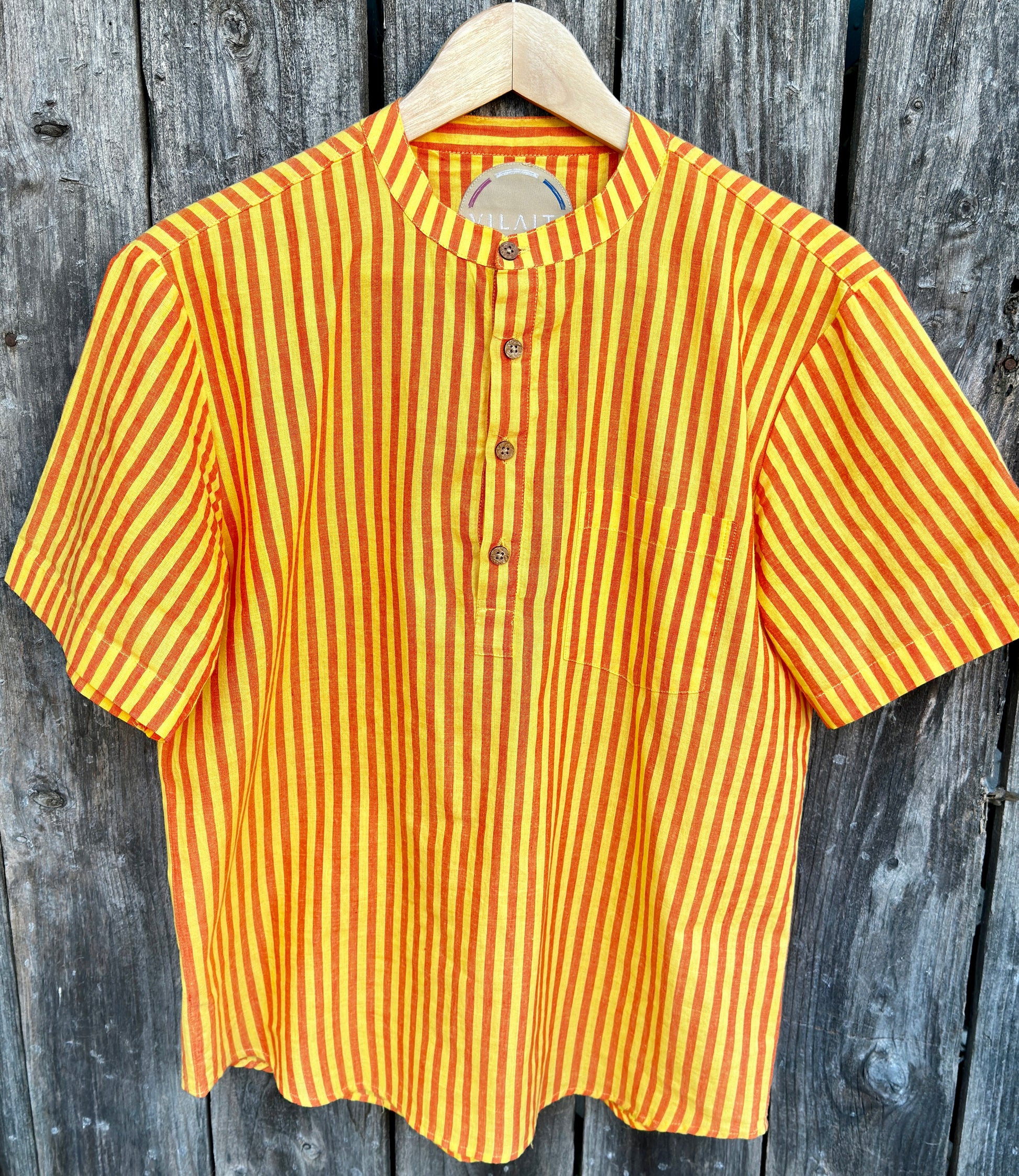 Garmee Summer | Kurta | Band Collar Men's Shirts Quarter Button Cotton. Showcasing the signature South Asian Band Collar neck coupled with coconut button enclosures; The Kurta effortlessly blends Eastern aesthetics with Western style. Quarter button, yellow & red stripes. A shirt designed to be a South Asian inspired elevated casual cotton shirt. 